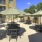 a group of tables and chairs outside