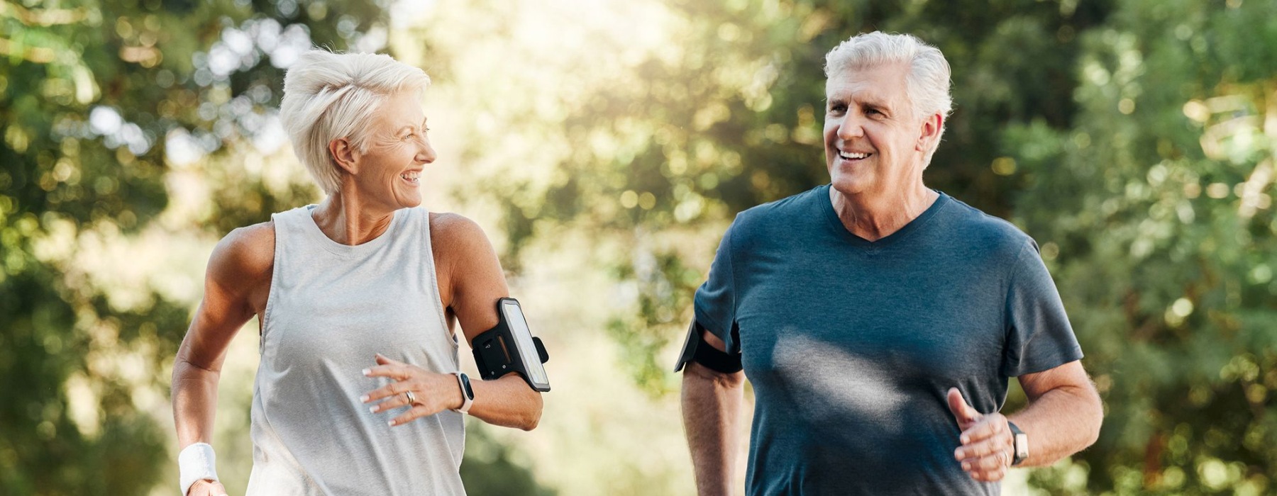 a man and a woman jogging outdoors